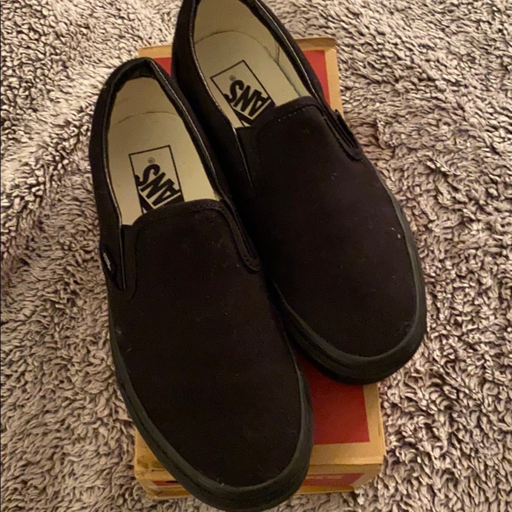 Unisex black slip on Vans